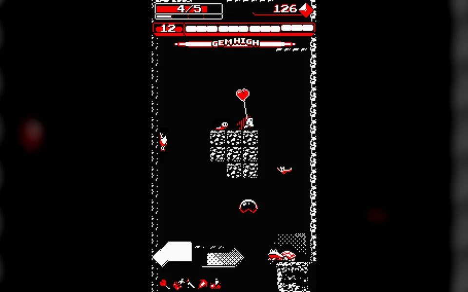 Downwell gameplay screenshot, vertical descent arcade action